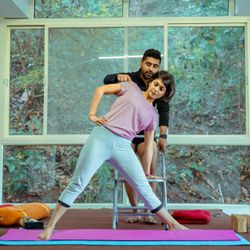 Portrait of yoga instructor Myroslava Stepanenko smiling warmly